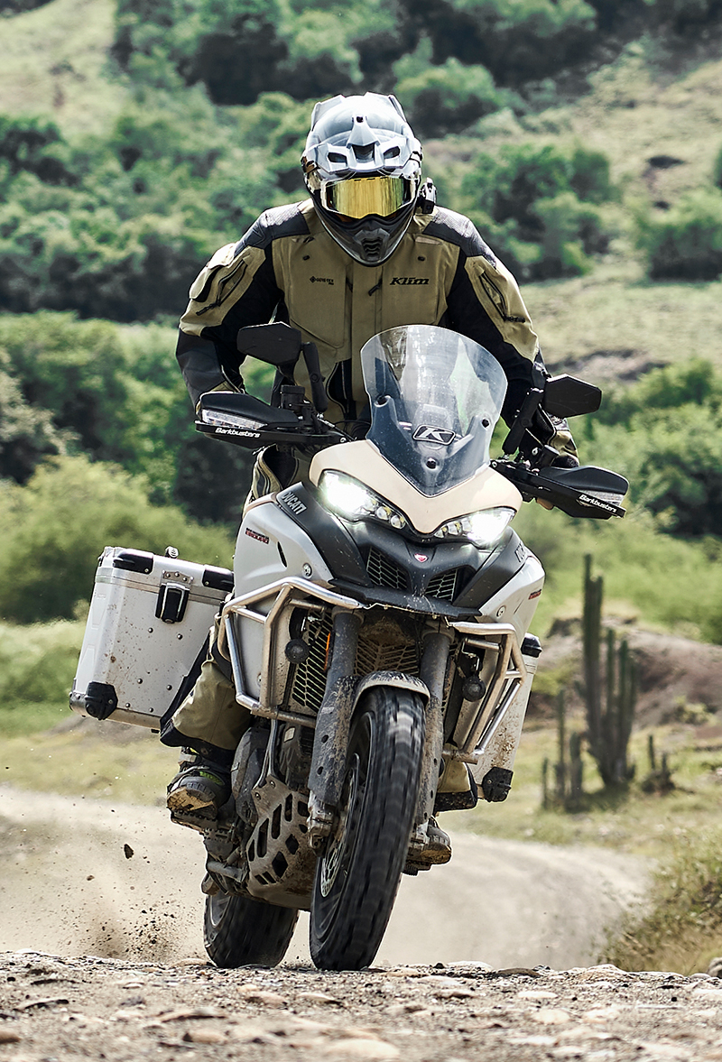 Guy wearing Klim Badlands A3 suit off road